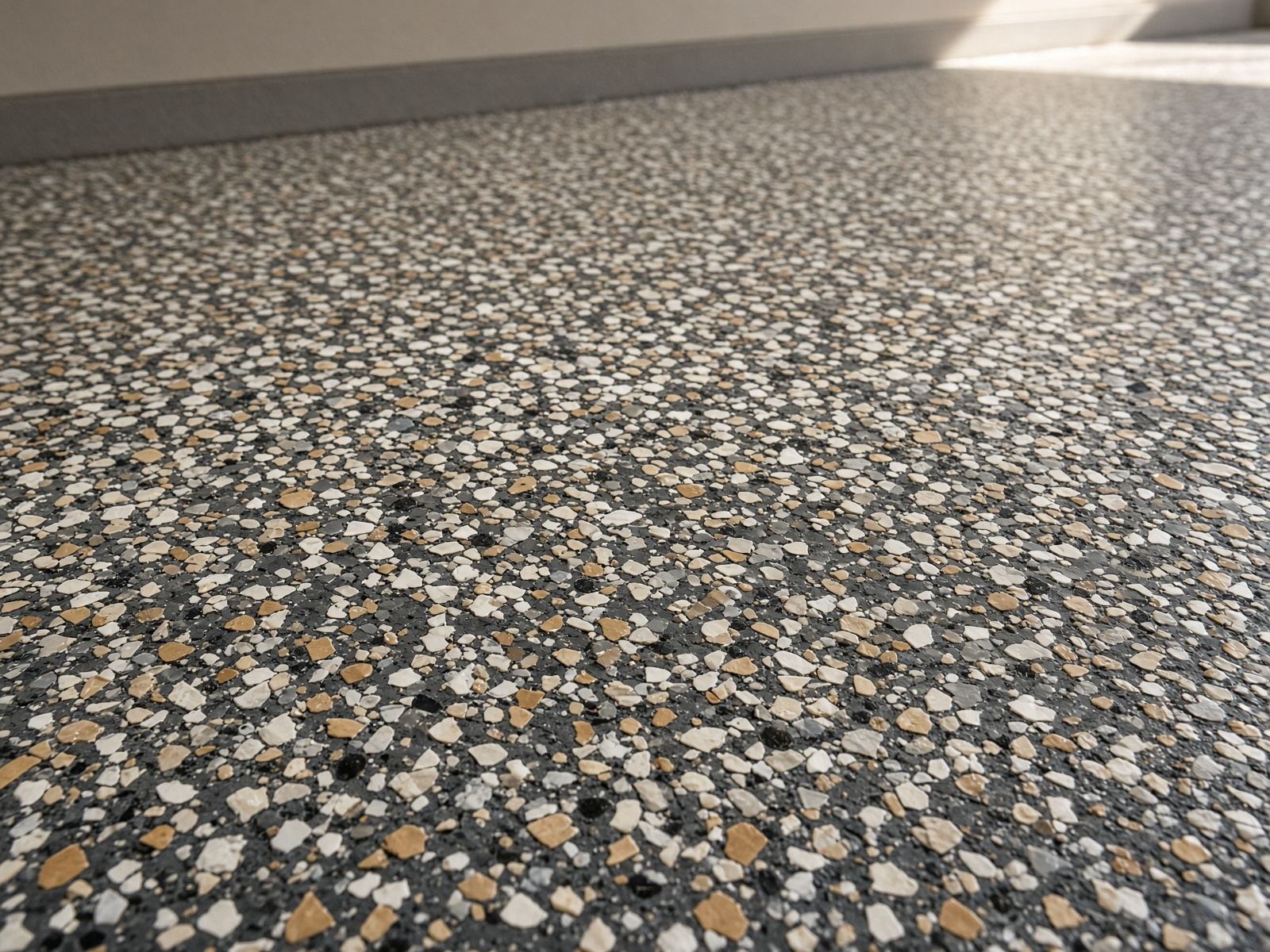 Sample vinyl flake texture in charcoal, tan, and gray. Color is a sample, not a guaranteed match.